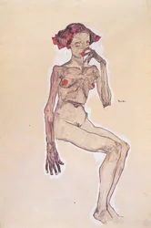 Desnudo de niña sentada